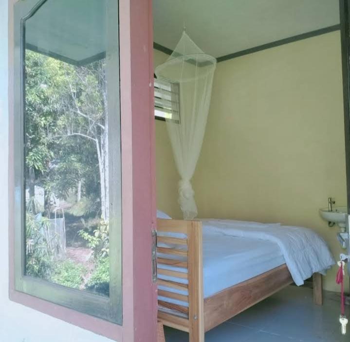 Wisma Kelimutu Ende Buitenkant foto